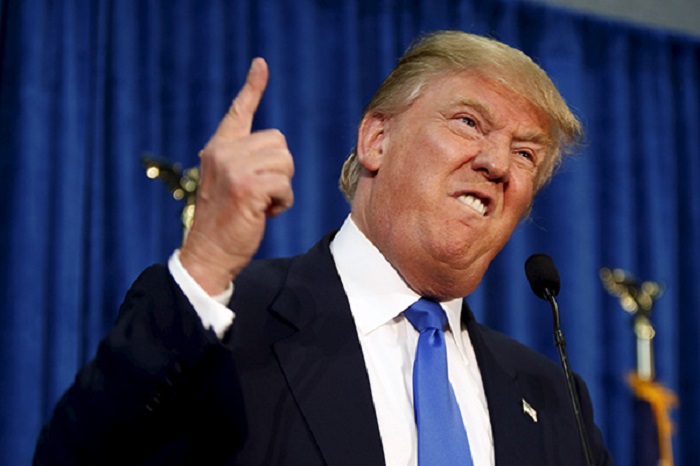Man who attempted to grab gun at rally wanted `to kill Trump` 